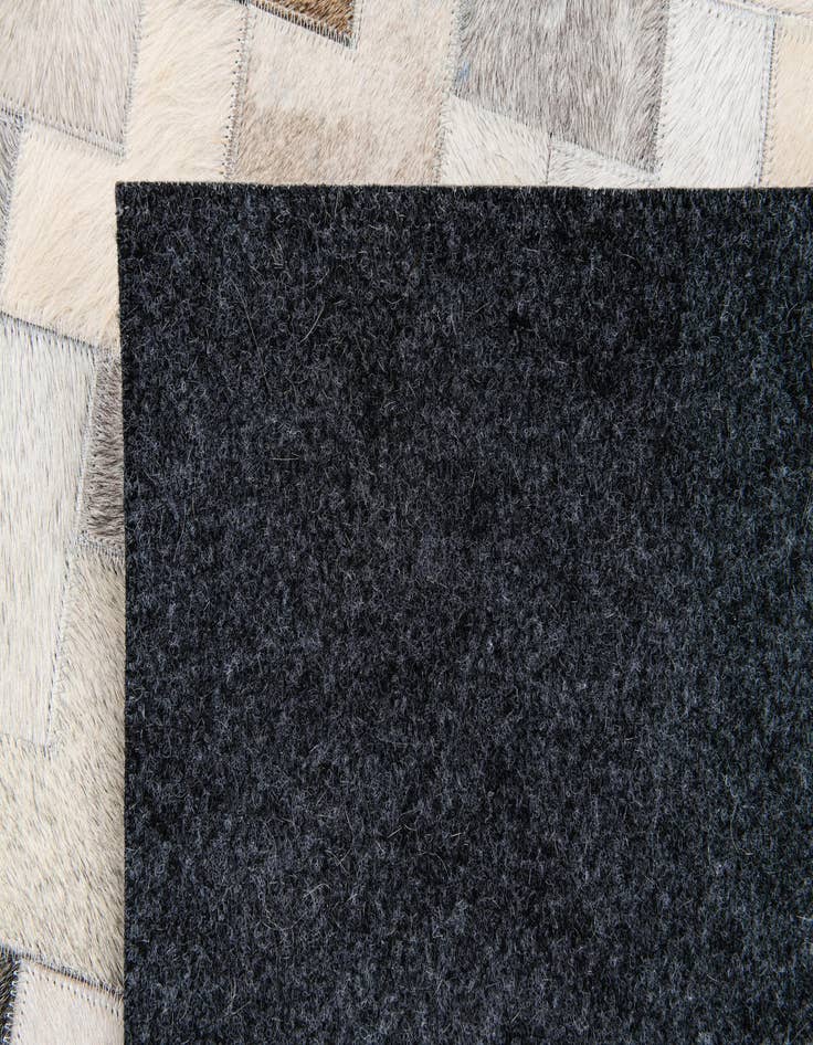 Detail image of  4' 1 x 6' Cowhide Stocks Rug