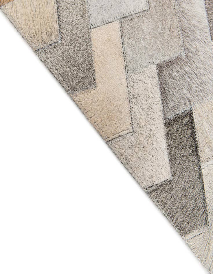 Detail image of  4' 1 x 5' 11 Cowhide Stocks Rug