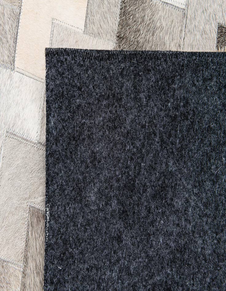 Detail image of  4' 1 x 5' 11 Cowhide Stocks Rug