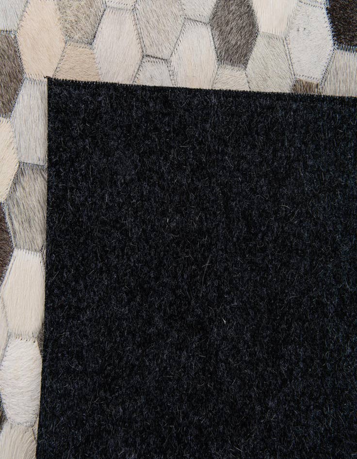 Detail image of  4' x 5' 10 Cowhide Stocks Rug