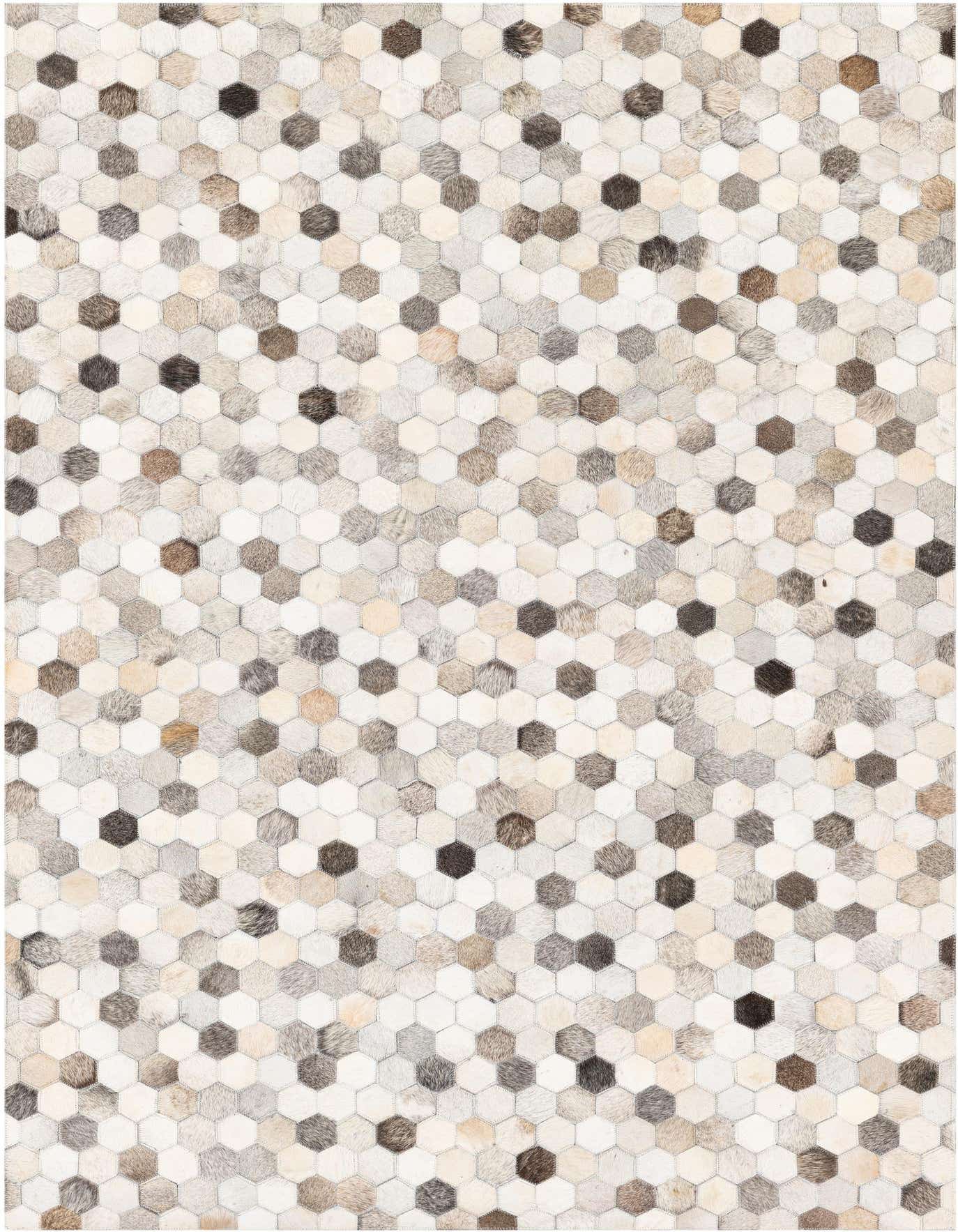 A 4x6 rectangular Cowhide Stocks rug featuring a modern hexagonal patchwork pattern in multi-colored natural cowhide and leather.