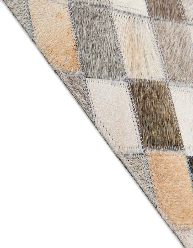Detail image of  4' 1 x 6' Cowhide Stocks Rug