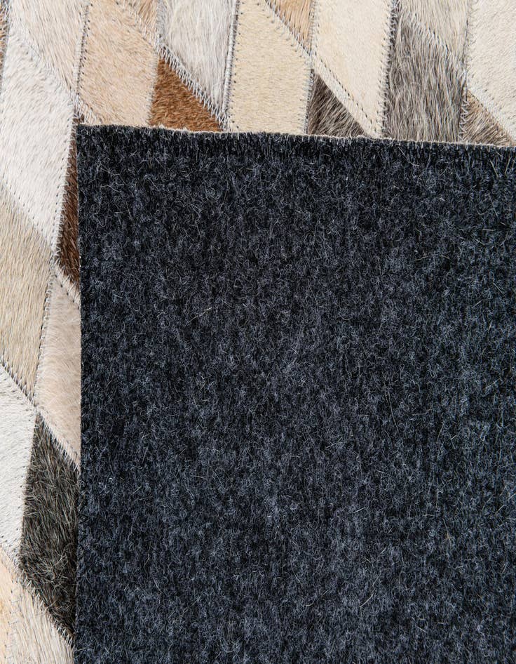 Detail image of  4' 1 x 6' Cowhide Stocks Rug