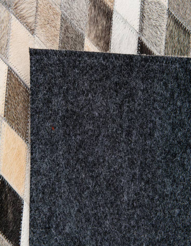 Detail image of  3' 11 x 6' 3 Cowhide Stocks Rug