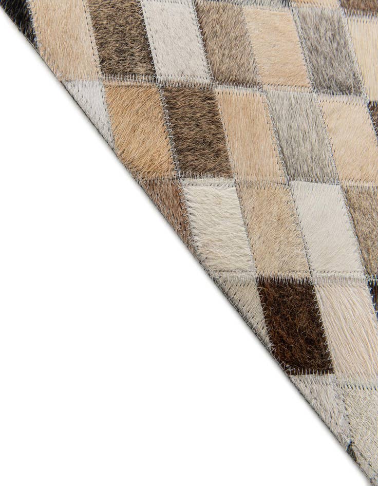 Detail image of  4' 1 x 5' 11 Cowhide Stocks Rug