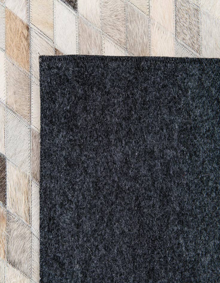 Detail image of  4' 1 x 6' Cowhide Stocks Rug