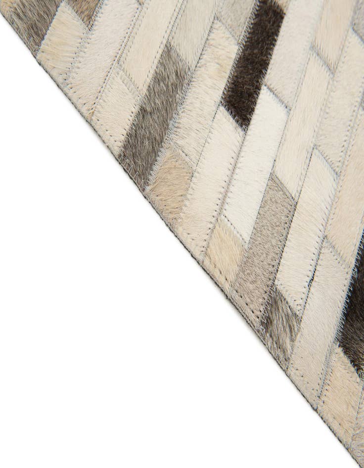Detail image of  3' 11 x 5' 10 Cowhide Stocks Rug