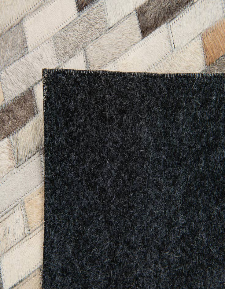 Detail image of  3' 11 x 5' 10 Cowhide Stocks Rug