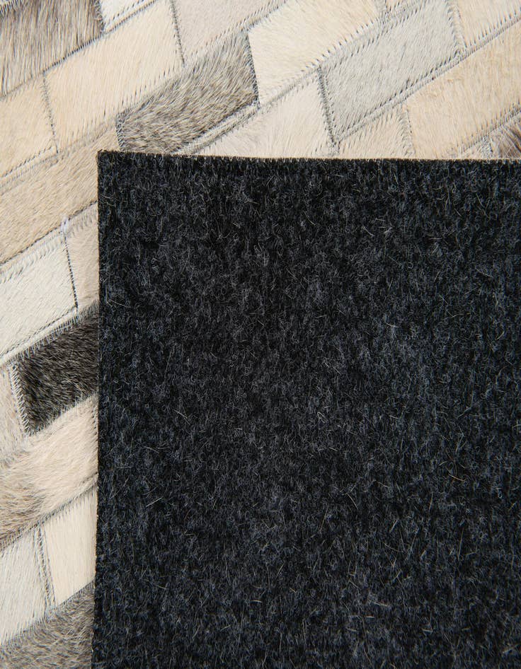 Detail image of  4' x 5' 11 Cowhide Stocks Rug