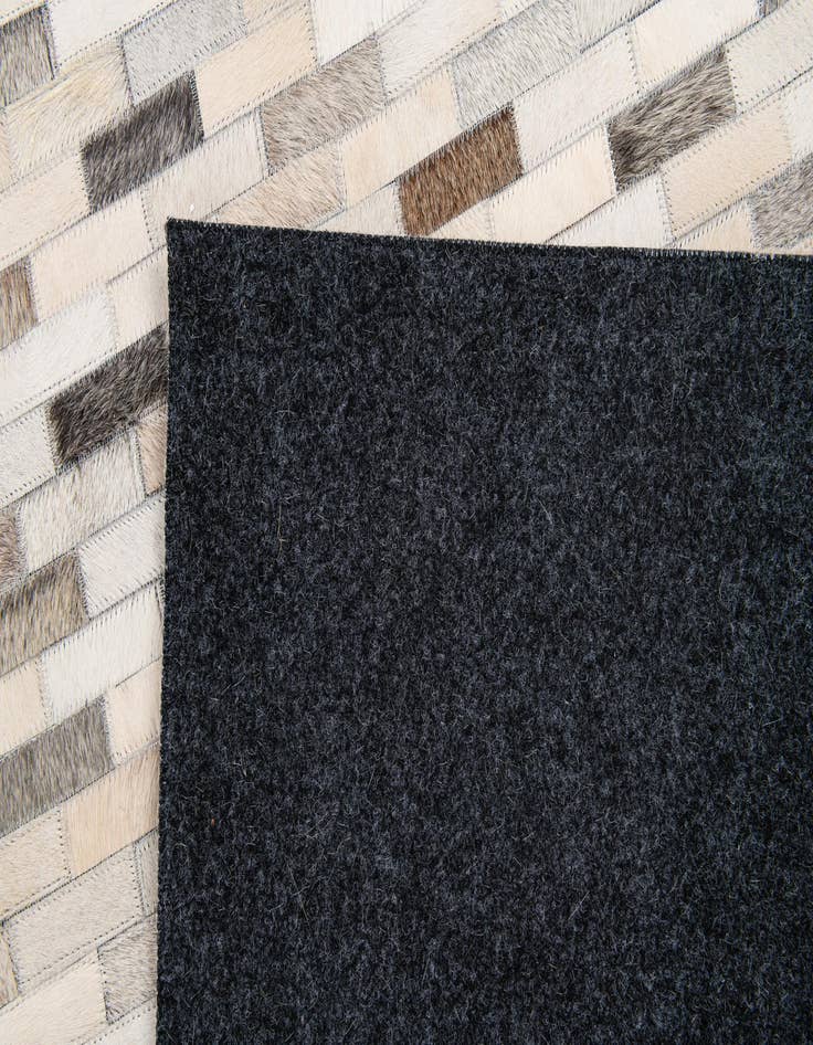 Detail image of  4' x 5' 11 Cowhide Stocks Rug