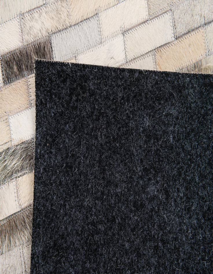 Detail image of  3' 11 x 6' 1 Cowhide Stocks Rug