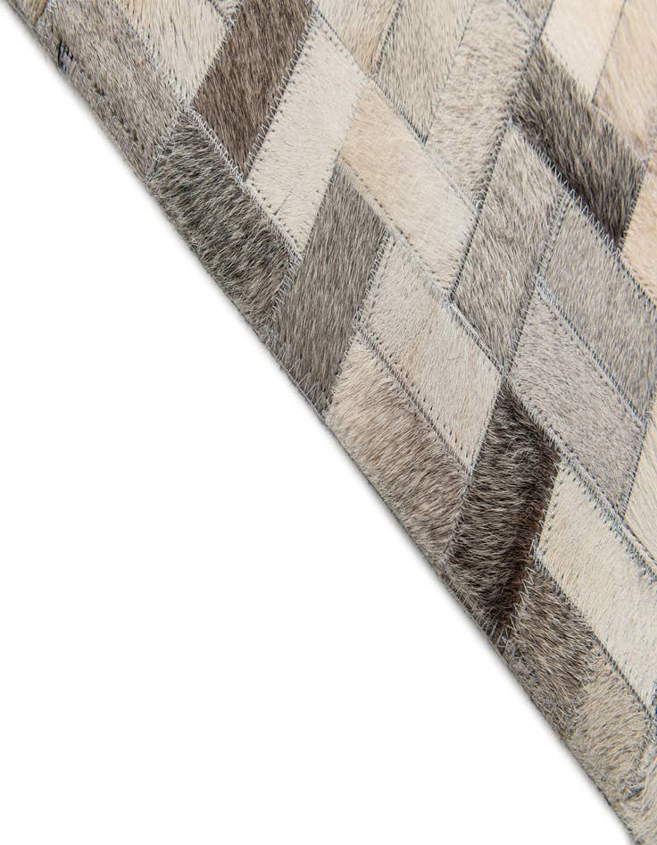 Detail image of  4' 1 x 5' 10 Cowhide Stocks Rug
