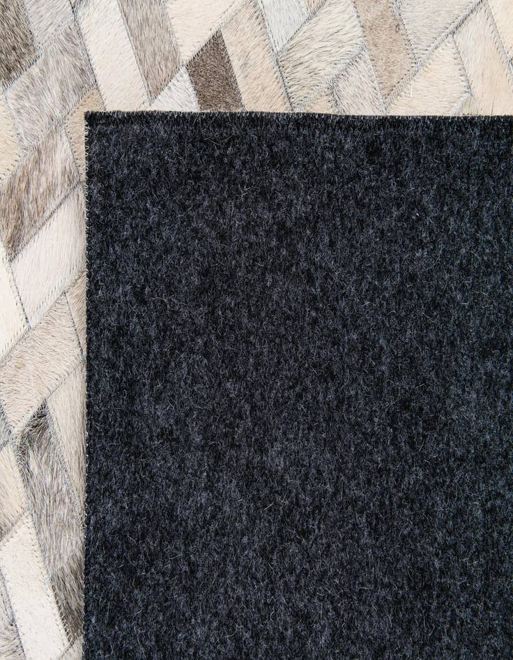 Detail image of  4' 1 x 6' 1 Cowhide Stocks Rug