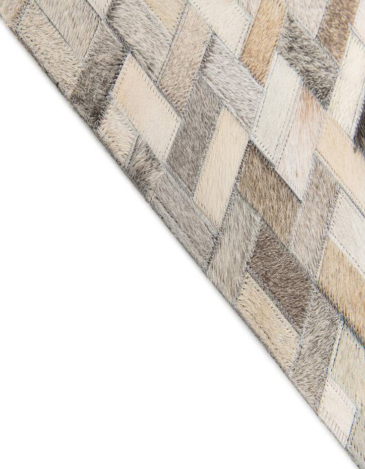 Detail image of  4' 1 x 5' 10 Cowhide Stocks Rug