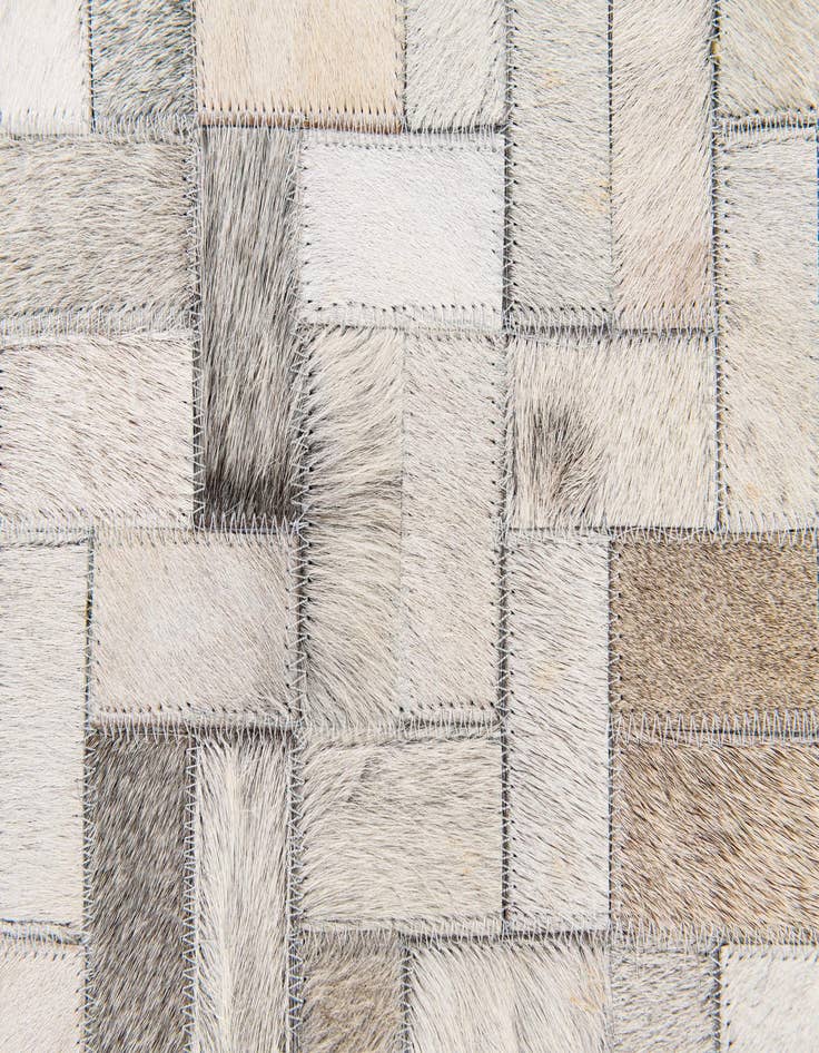 Detail image of  6' 8 x 9' 10 Cowhide Stocks Rug