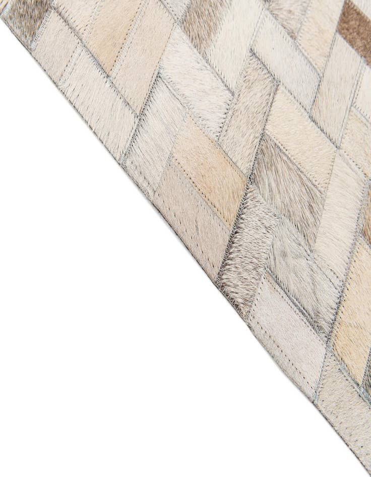 Detail image of  6' 7 x 9' 9 Cowhide Stocks Rug