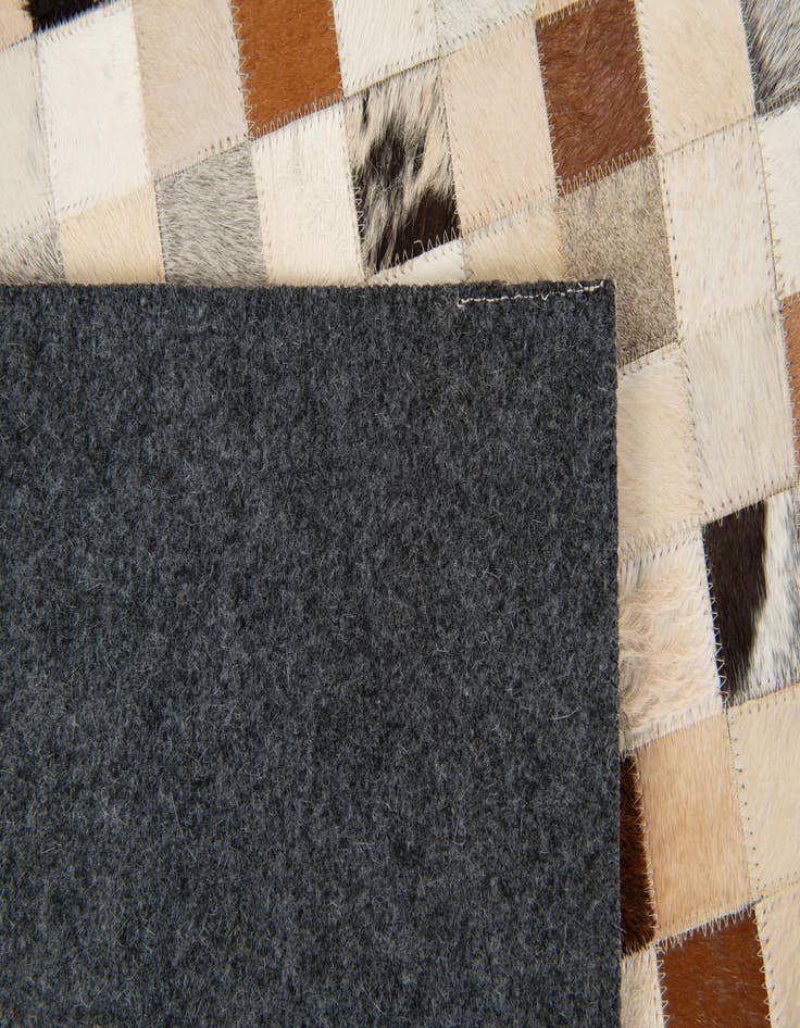 Detail image of  8' x 9' 9 Cowhide Stocks Rug