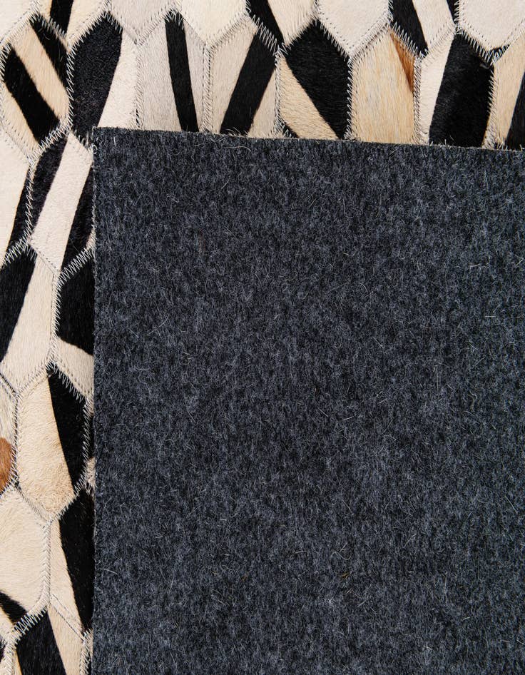 Detail image of  8' 1 x 9' 10 Cowhide Stocks Rug