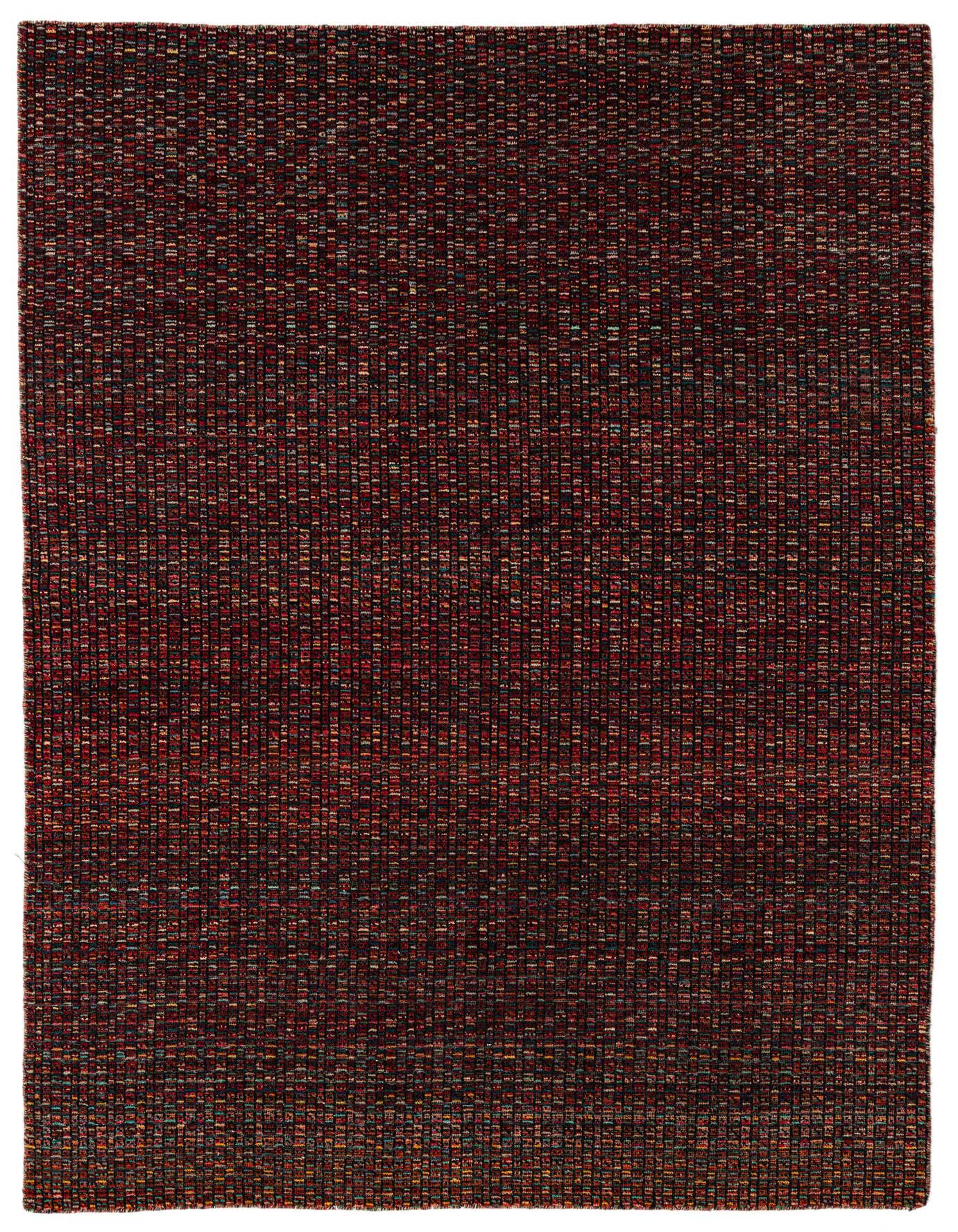 A rectangular 5x8 Darya rug in multi-colored wool, featuring a textured modern abstract pattern with rich reds, blues, and yellows.