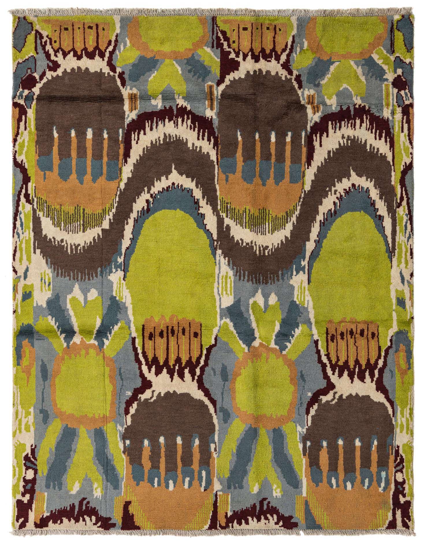 A 6x9 rectangular multi-colored wool rug with a modern abstract pattern in shades of brown, lime green, blue, and orange.