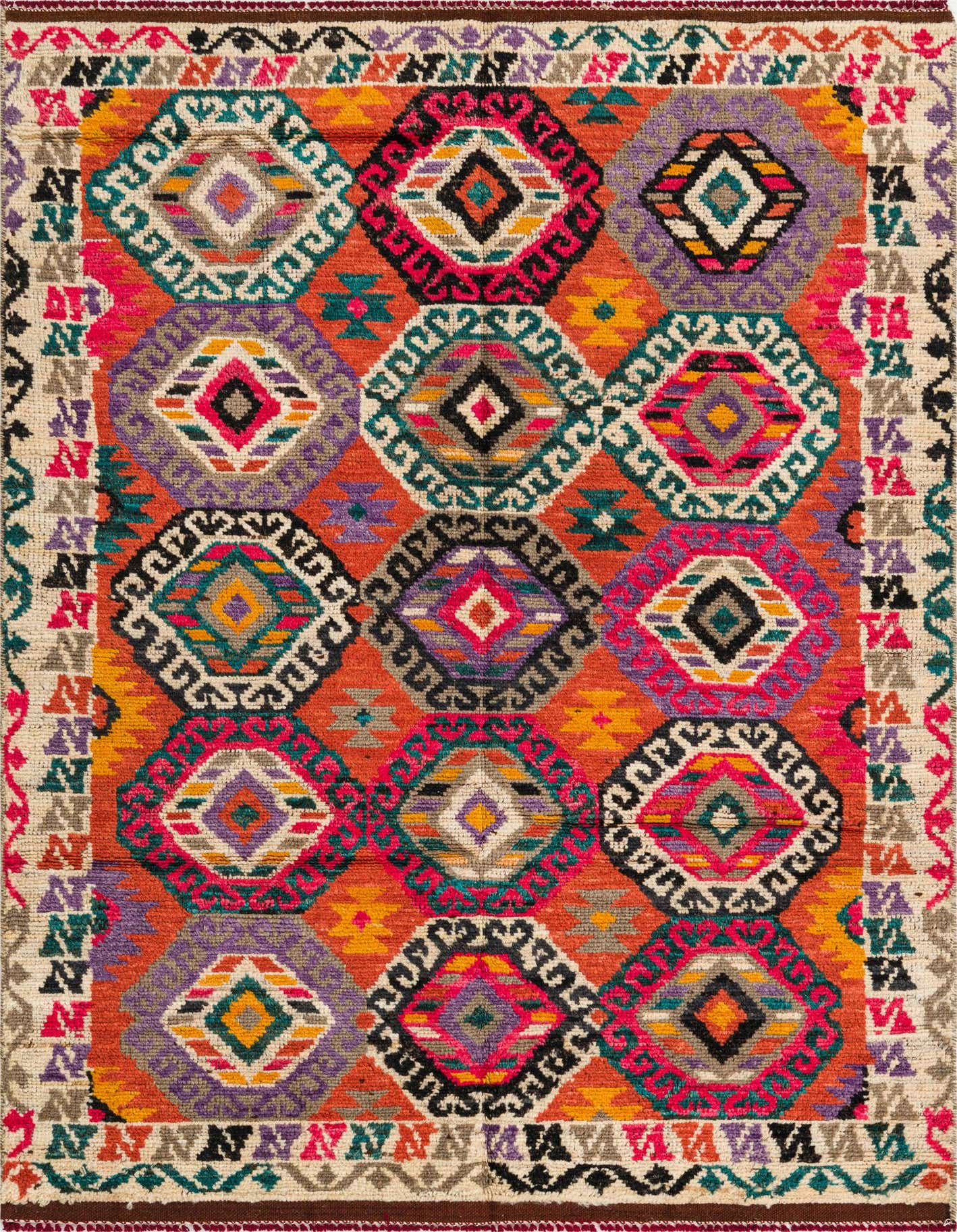 A vibrant 5x8 multi-colored rectangular wool rug with a modern geometric pattern of interlocking diamonds and a decorative border.