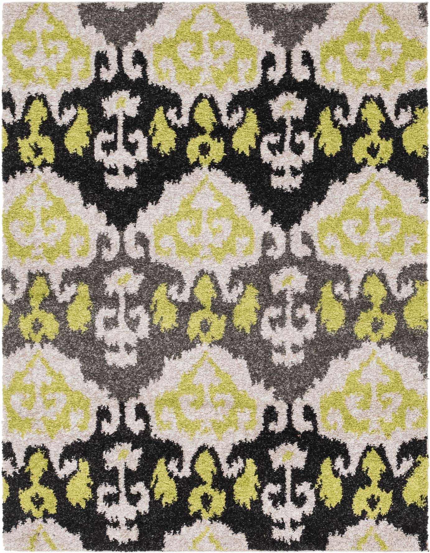 A 5x8 rectangular Diana collection rug featuring a bold transitional tribal pattern in black, lime green, gray, and cream.
