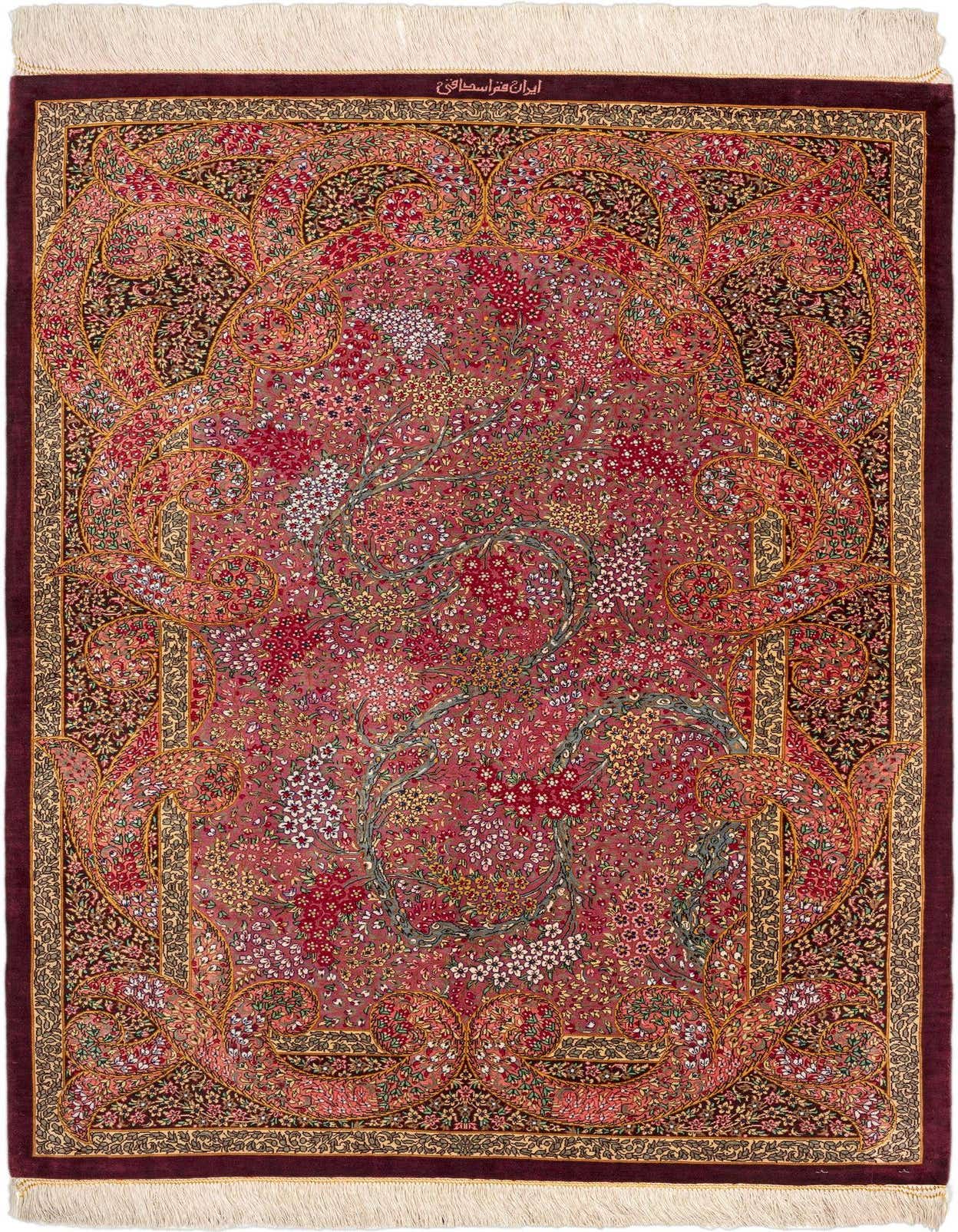 A vibrant 3x5 rectangular Persian Ghom Silk rug with a multi-colored floral and vine pattern on a rich red background, featuring intricate borders and delicate fringe.