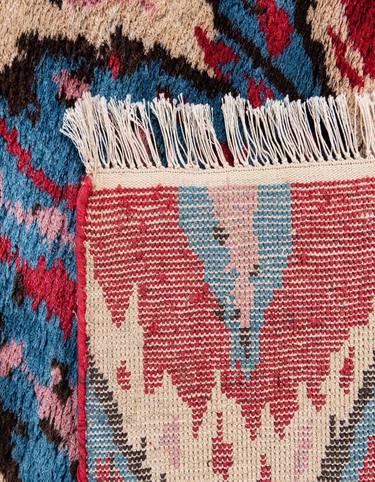 Detail image of  3' 2 x 5' 2  Hand Knotted Ikat Wool Rug