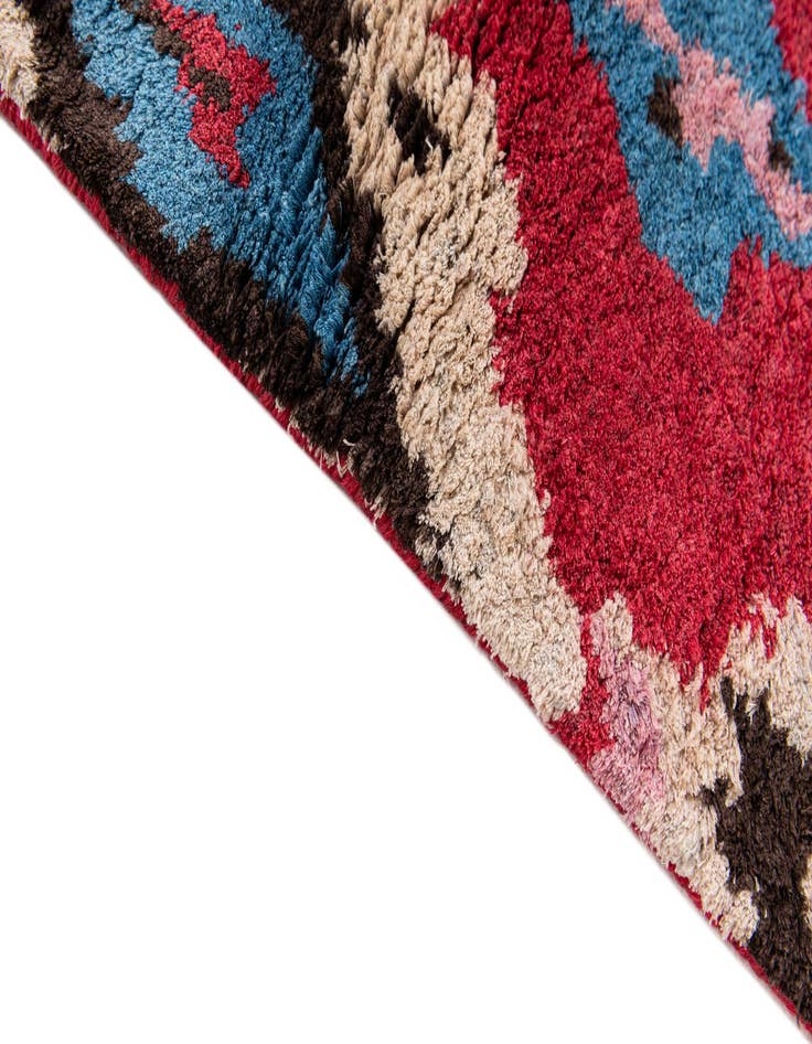Detail image of  3' 2 x 5' 2  Hand Knotted Ikat Wool Rug