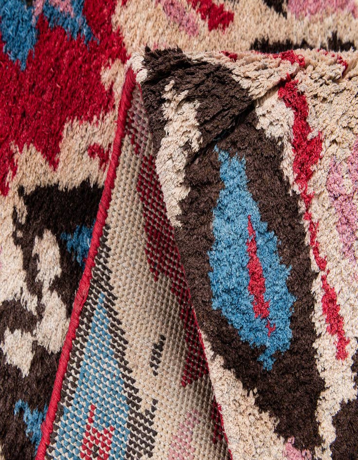 Detail image of  3' 2 x 5' 2  Hand Knotted Ikat Wool Rug