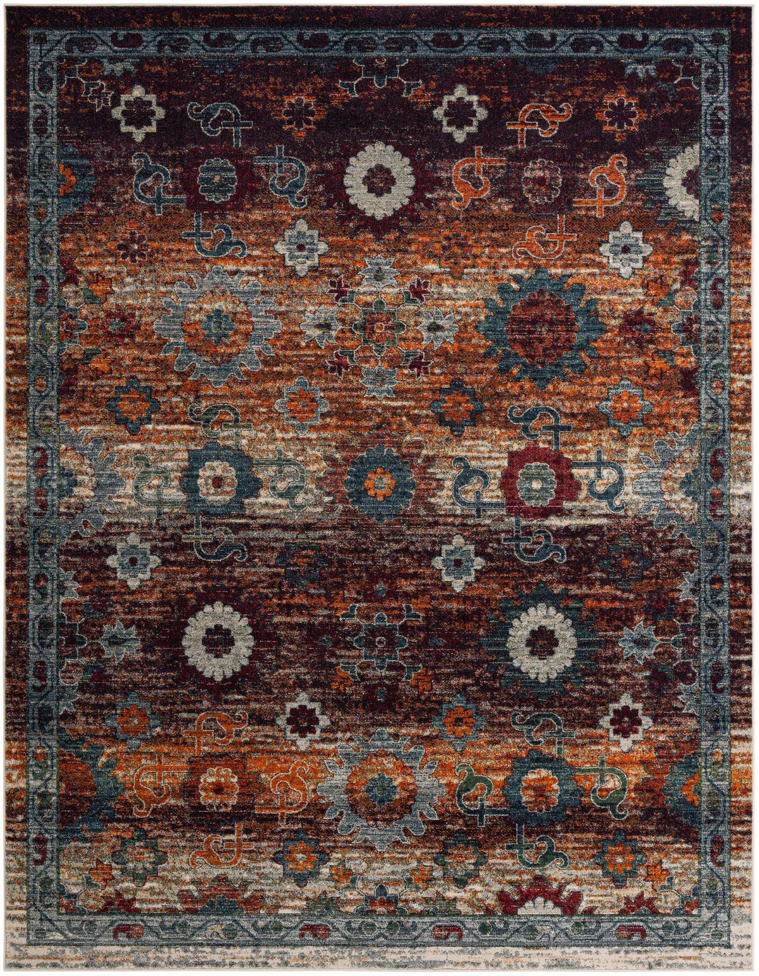 A 9x12 rectangular multi-colored rug with a distressed traditional floral pattern in shades of orange, blue, and cream on a dark background.