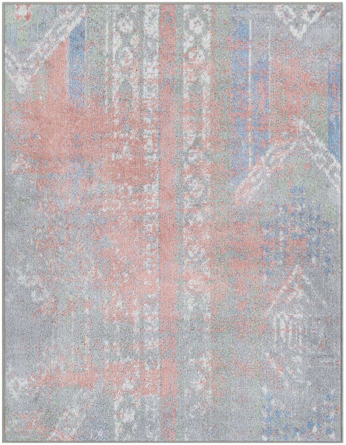 A 3x5 rectangular Kamala Washable rug featuring a distressed Southwestern and vintage pattern in multi-colored hues.
