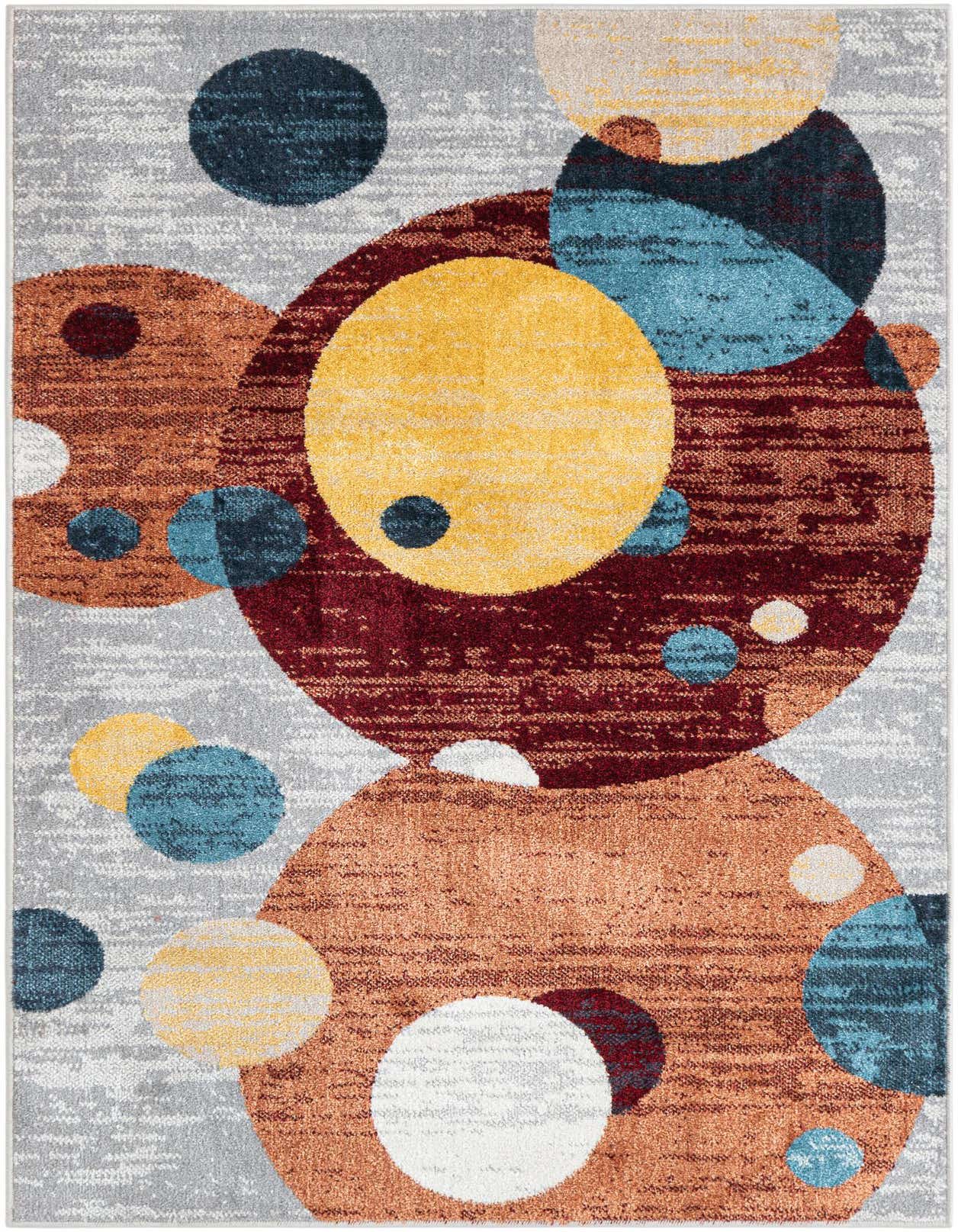 A 3x5 rectangular multi-colored modern rug with an abstract pattern of overlapping circles in shades of yellow, blue, red, and brown on a light gray background.