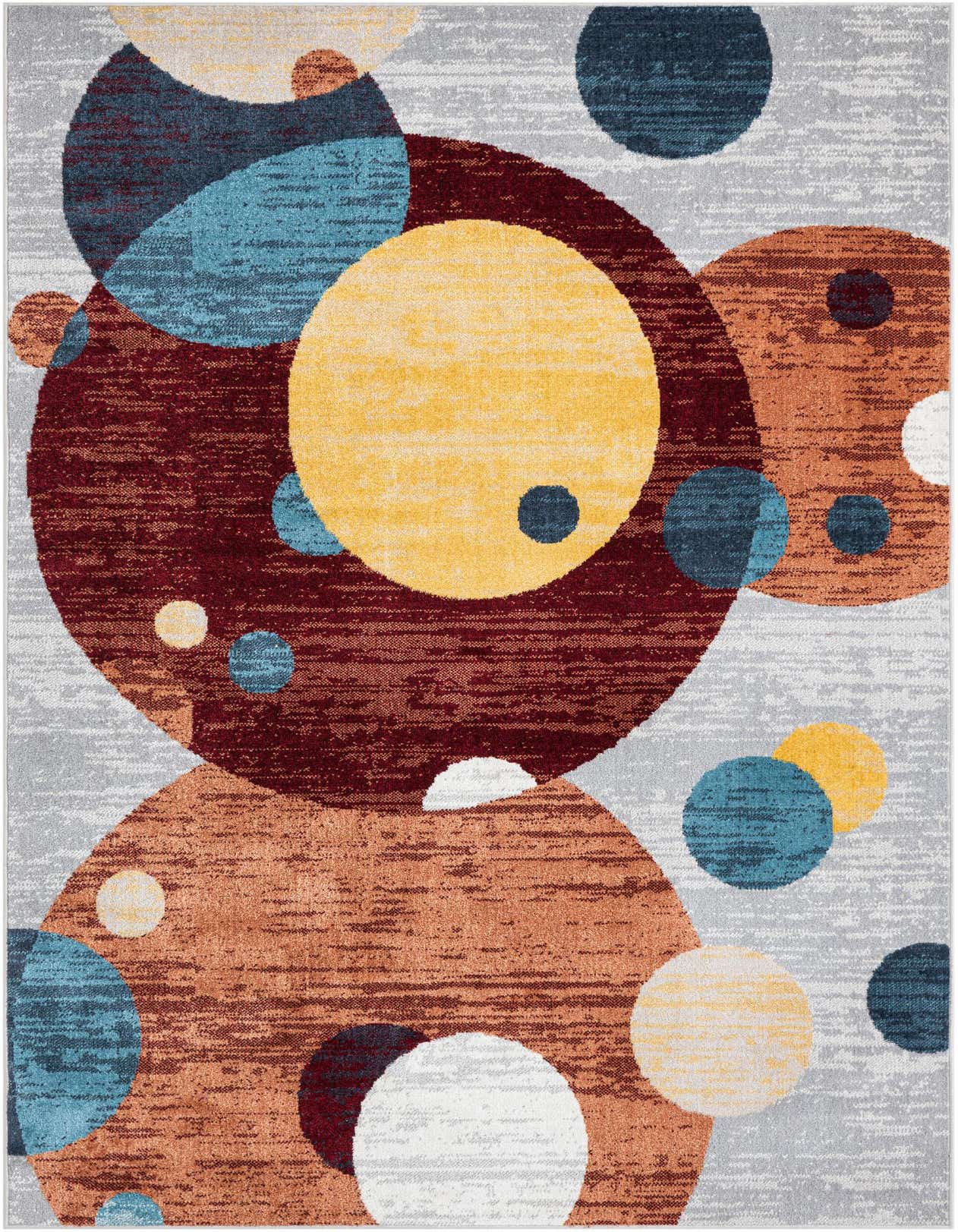 A 5x8 multi-colored rectangular rug with an abstract modern pattern of overlapping circles in shades of red, orange, yellow, and blue on a grey background.