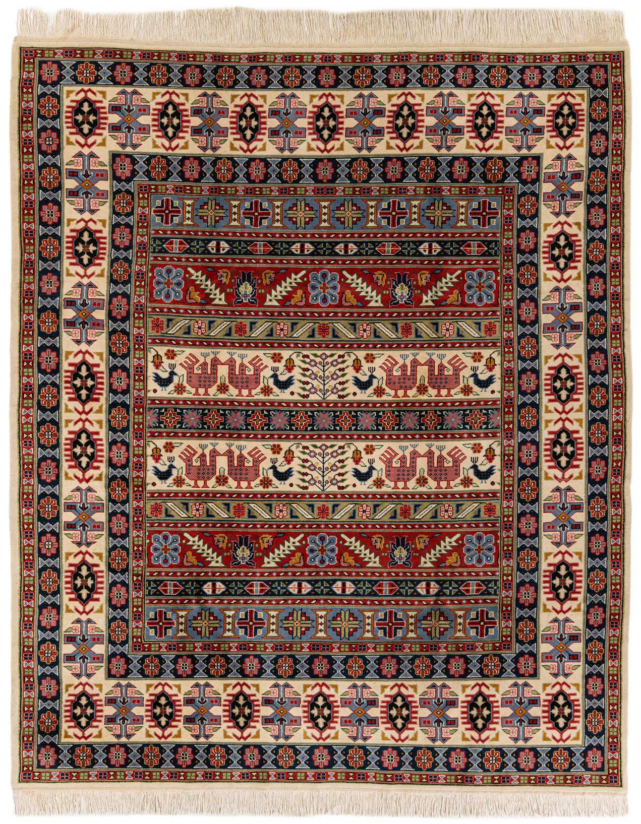 A 7x10 rectangular multi-colored traditional Oriental rug with intricate patterns and birds on a cream background.