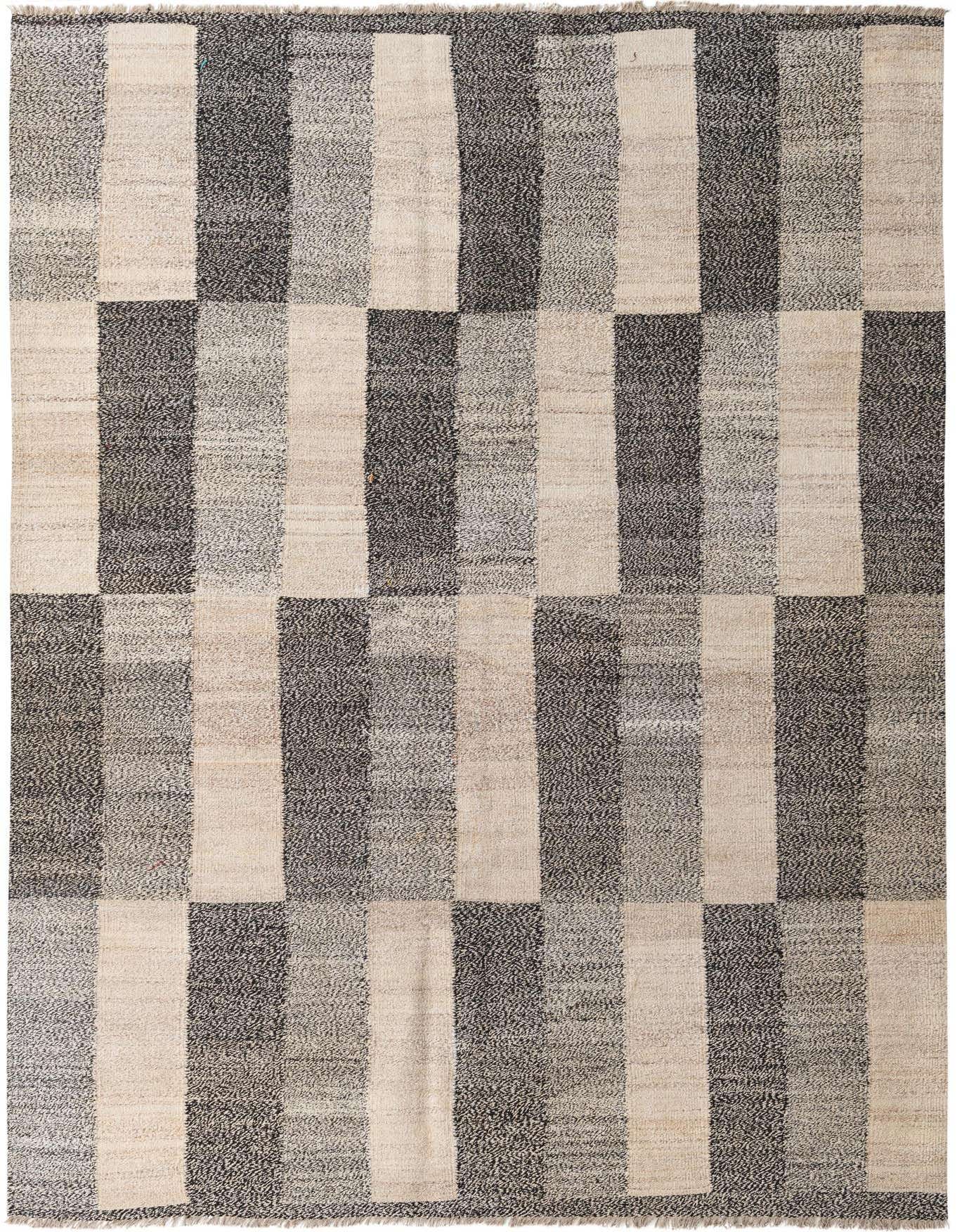 A 7x10 rectangular flatweave wool rug featuring a modern tribal pattern of alternating vertical stripes in varying shades of black, grey, and cream.