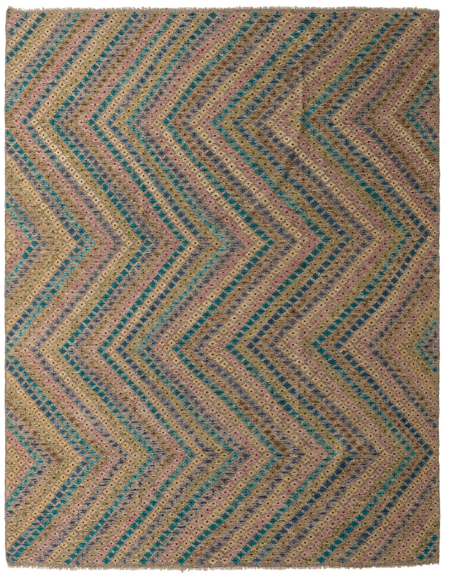 A 10x13 multi-colored rectangular wool rug featuring a modern tribal zigzag pattern in teal, pink, and brown hues.