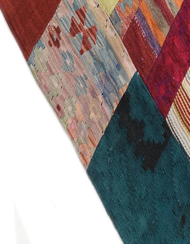 Detail image of  4' 5 x 7'  Hand Woven Kilim Patchwork Wool Rug