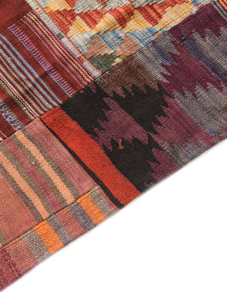 Detail image of  4' 1 x 5' 10  Hand Woven Kilim Patchwork Wool Rug