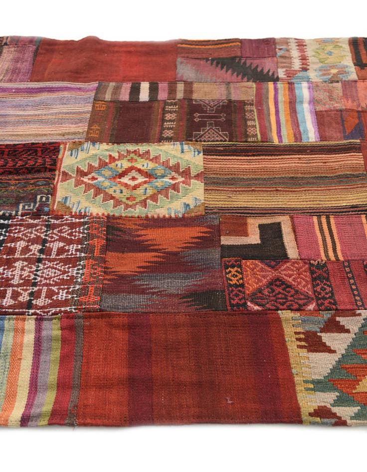 Detail image of  4' 2 x 5' 10  Hand Woven Kilim Patchwork Wool Rug