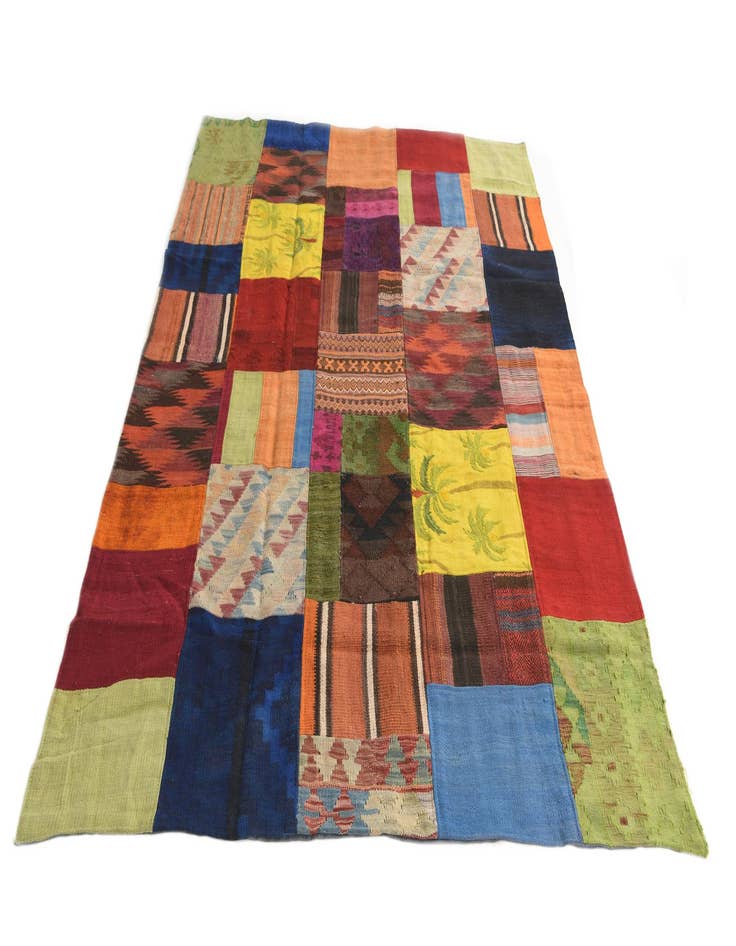 Detail image of  5' 4 x 7' 9  Hand Woven Kilim Patchwork Wool Rug