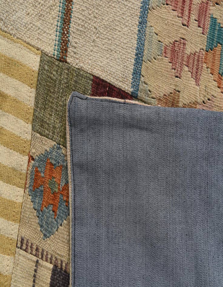 Detail image of  6' 6 x 8' 10  Hand Woven Kilim Patchwork Wool Rug