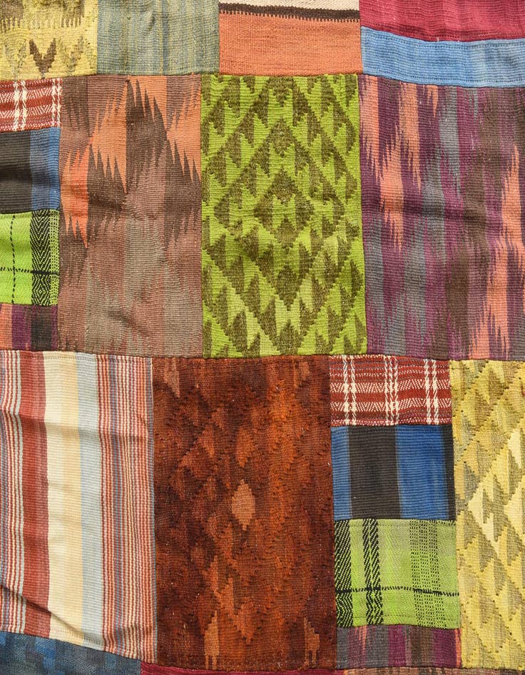 Detail image of  5' 4 x 7' 8  Hand Woven Kilim Patchwork Wool Rug