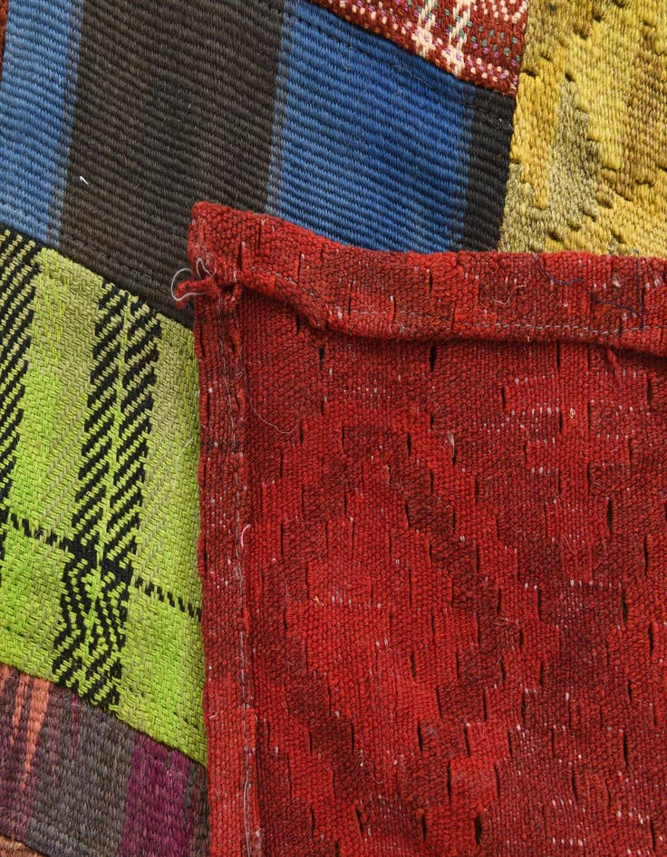 Detail image of  5' 4 x 7' 8  Hand Woven Kilim Patchwork Wool Rug
