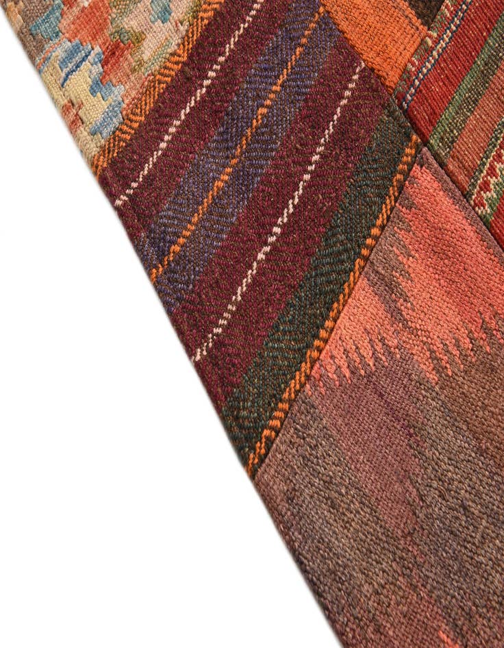 Detail image of  3' 10 x 5' 10  Hand Woven Kilim Patchwork Wool Rug
