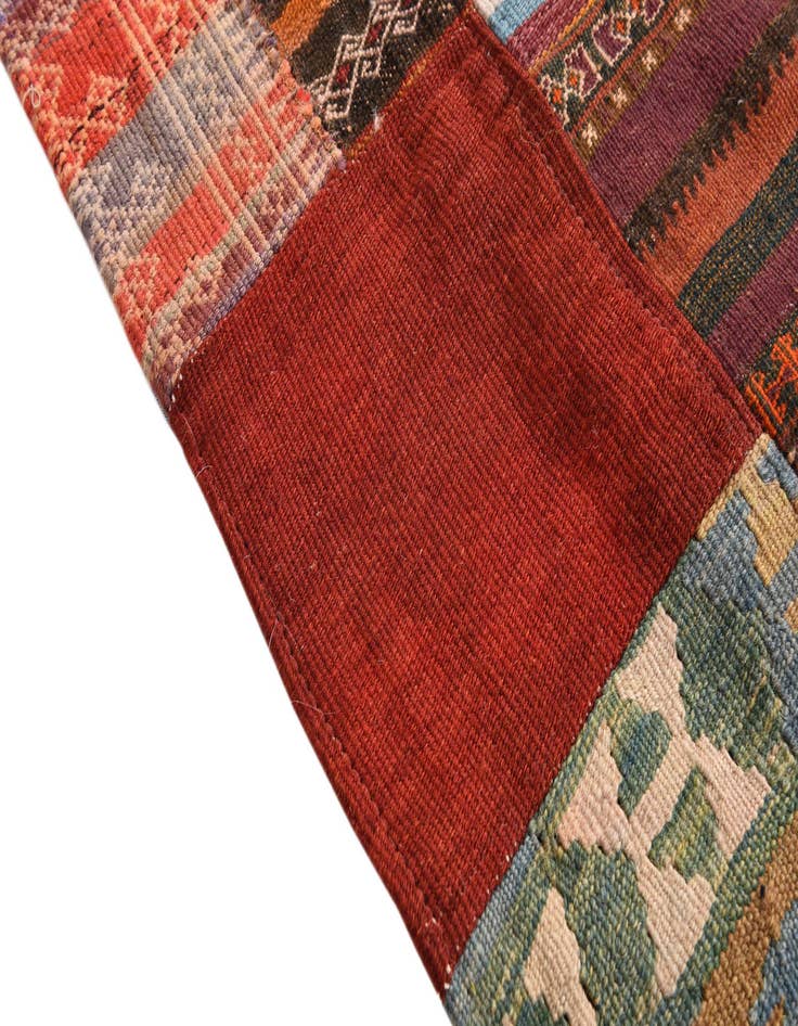 Detail image of  4' 1 x 5' 10  Hand Woven Kilim Patchwork Wool Rug