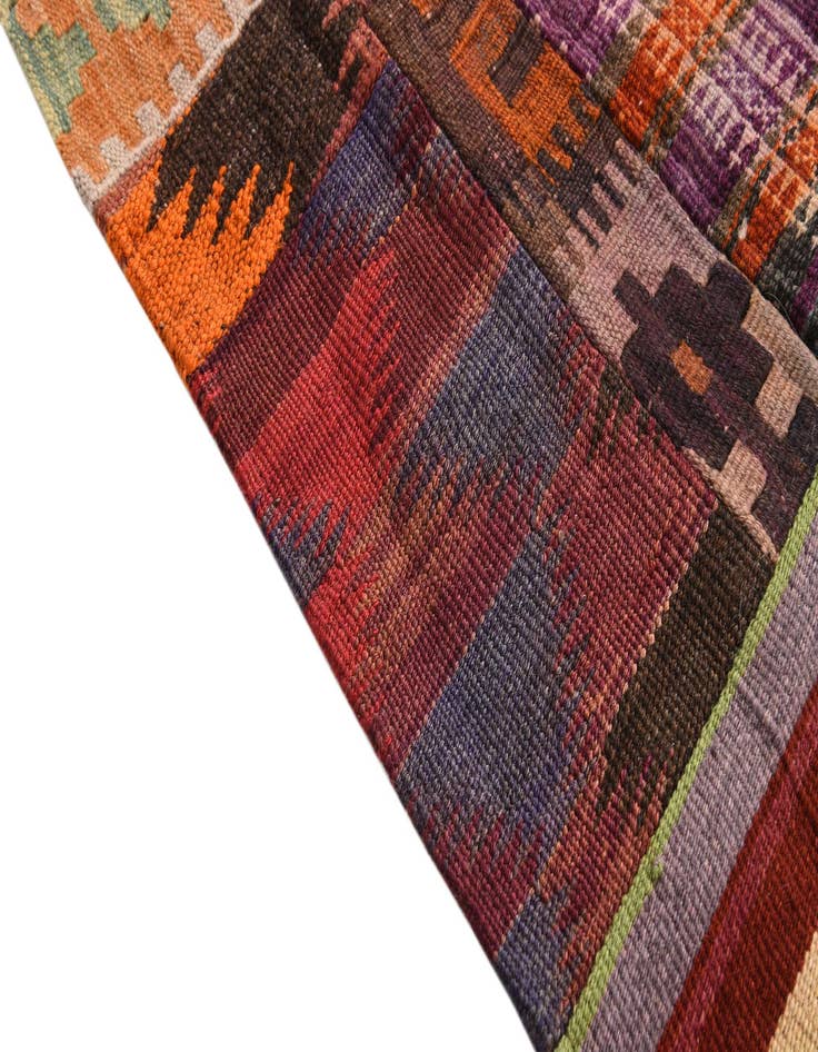 Detail image of  4' 1 x 6'  Hand Woven Kilim Patchwork Wool Rug