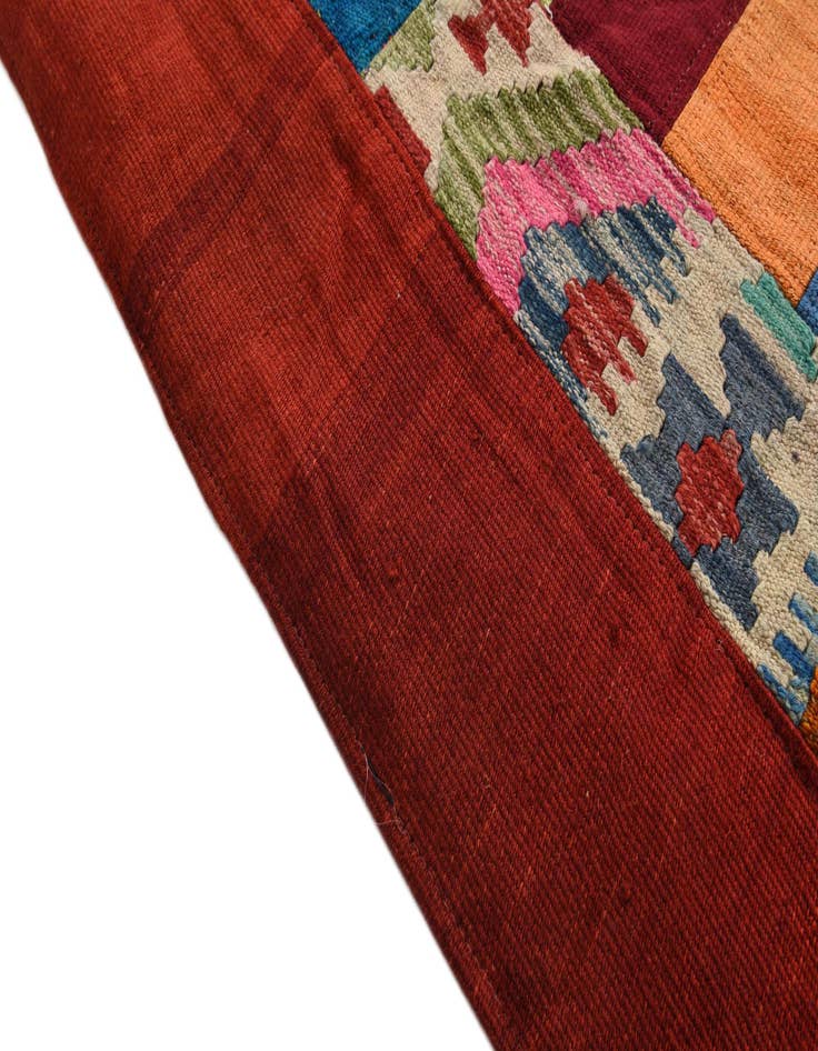 Detail image of  5' 7 x 8' 1  Hand Woven Kilim Patchwork Wool Rug