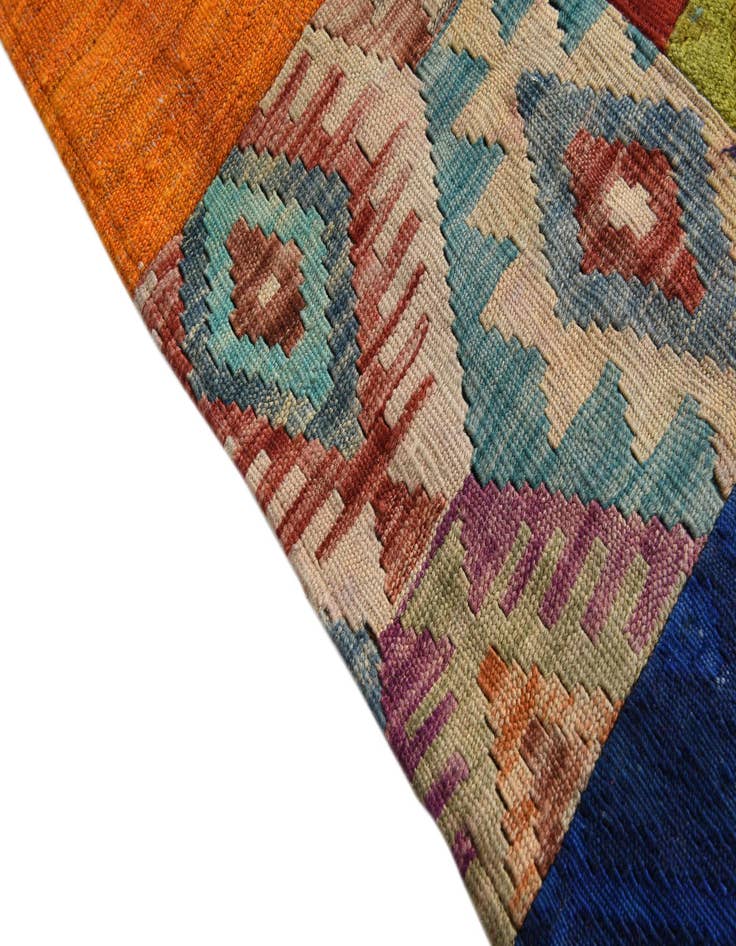 Detail image of  5' 6 x 7' 7  Hand Woven Kilim Patchwork Wool Rug
