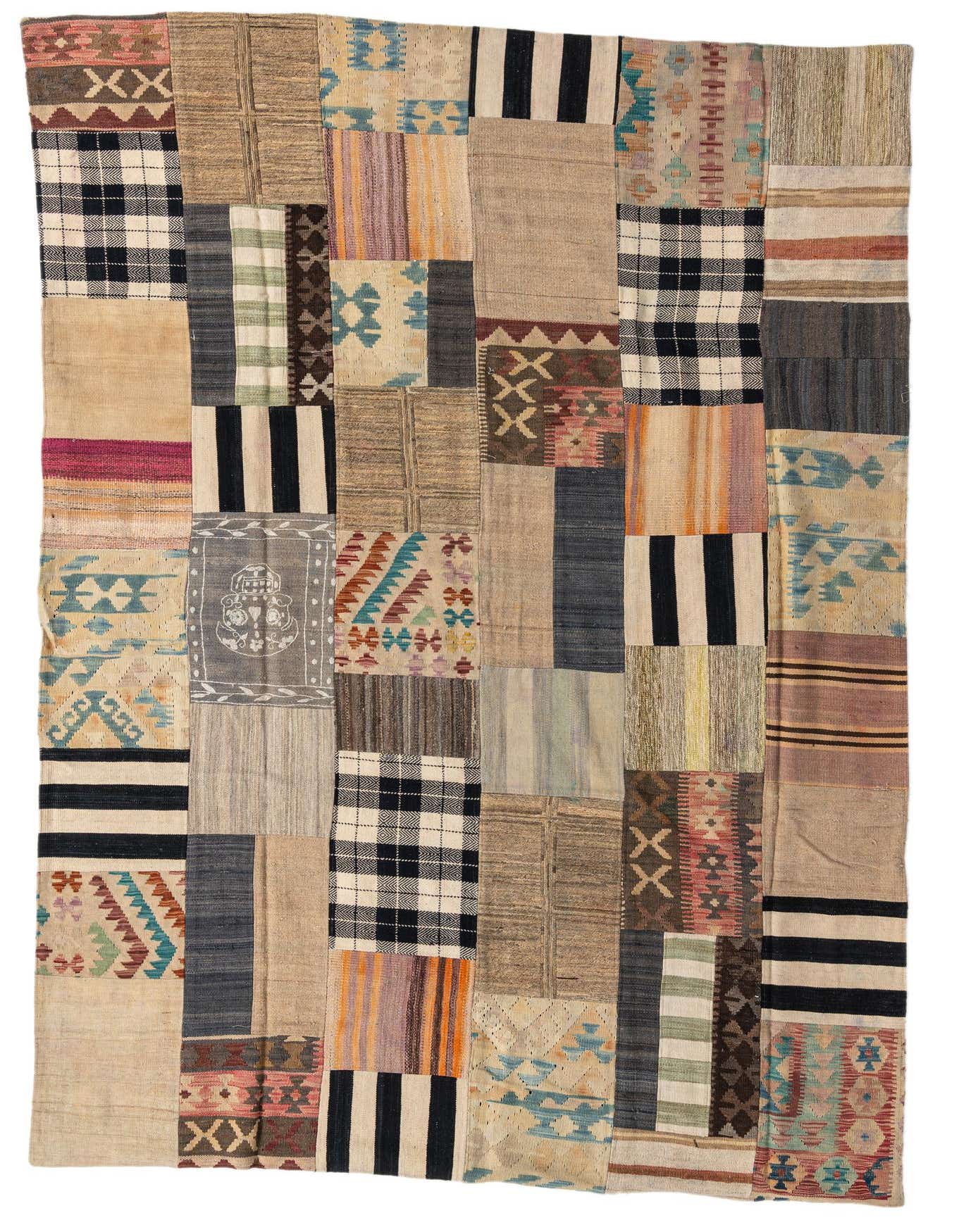 A 6x9 rectangular multi-colored Kilim Patchwork rug, handmade with diverse Southwestern and tribal patterns.